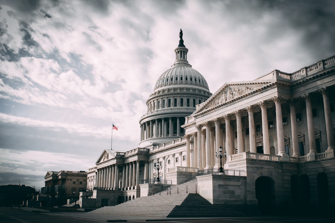 second chance act — white concrete building under cloudy sky during daytime